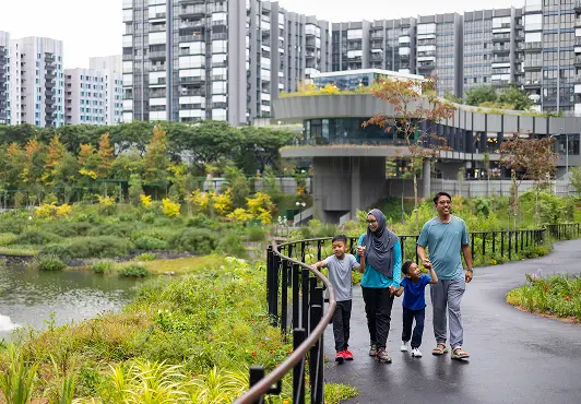 Serene garden landscape with traditional East Asian architecture, lush greenery and tranquil water features